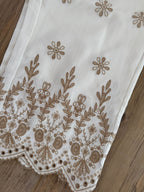 Pantalon beige avec broderie beige