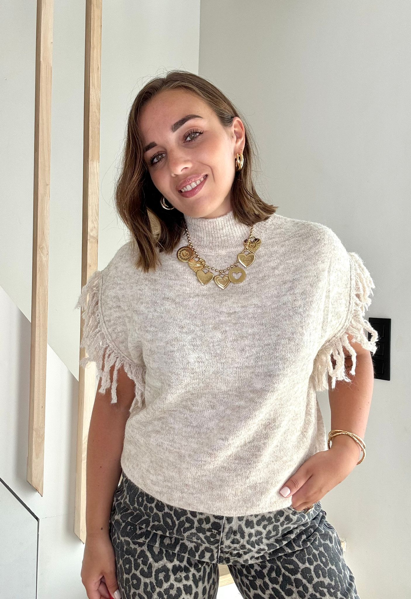 pull sans manche, collier coeur